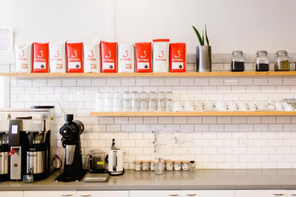 bagel mill counter set-up with ritual bags